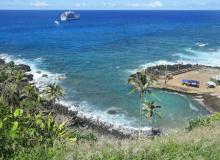 The <i>Aranui 5</i> anchored off Bounty Bay, Pitcairn Island. Photo by Jim Hamel